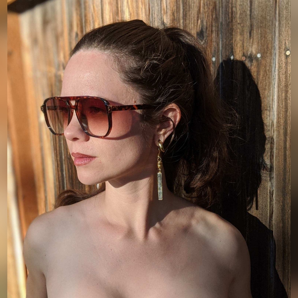 Tortoishell sunglasses with bespoke latex case